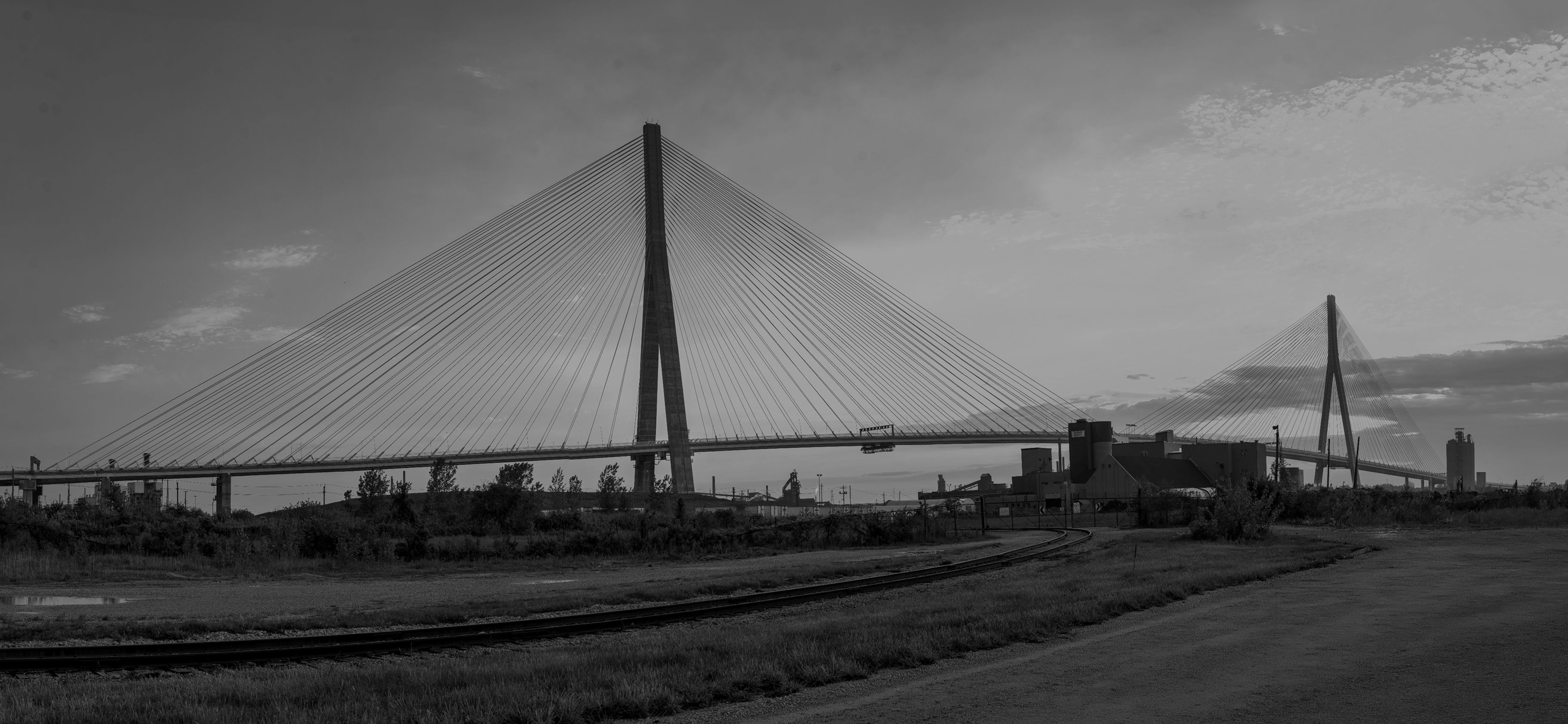 The Gordie Howe International Bridge at sunset, connecting Windsor to Detroit.